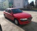 Красный Опель Вектра, объемом двигателя 1.8 л и пробегом 500 тыс. км за 500 $, фото 1 на Automoto.ua