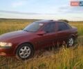 Красный Опель Вектра, объемом двигателя 1.8 л и пробегом 260 тыс. км за 3100 $, фото 1 на Automoto.ua