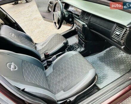 Опель Вектра 1997 в Каменское - Днепродзержинск на Automoto.ua Красный Опель Вектра, объемом двигателя 1.78 л и пробегом 350 тыс. км за 3499 $, фото 25 на Automoto.ua