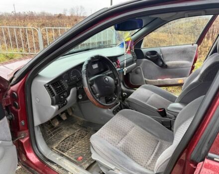 Красный Опель Вектра, объемом двигателя 1.6 л и пробегом 300 тыс. км за 2500 $, фото 1 на Automoto.ua