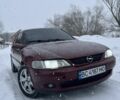 Красный Опель Вектра, объемом двигателя 1.8 л и пробегом 325 тыс. км за 1900 $, фото 1 на Automoto.ua