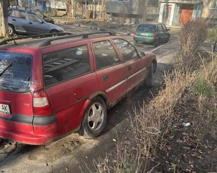 Красный Опель Вектра, объемом двигателя 0 л и пробегом 100 тыс. км за 600 $, фото 2 на Automoto.ua