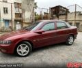 Красный Опель Вектра, объемом двигателя 1.6 л и пробегом 305 тыс. км за 3700 $, фото 1 на Automoto.ua