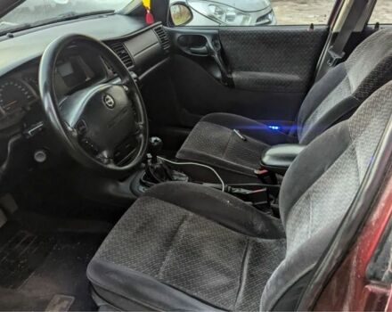 Красный Опель Вектра, объемом двигателя 1.8 л и пробегом 220 тыс. км за 950 $, фото 3 на Automoto.ua