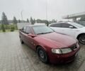 Красный Опель Вектра, объемом двигателя 1.8 л и пробегом 295 тыс. км за 1900 $, фото 1 на Automoto.ua