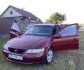 Червоний Опель Вектра, об'ємом двигуна 2 л та пробігом 300 тис. км за 1270 $, фото 1 на Automoto.ua