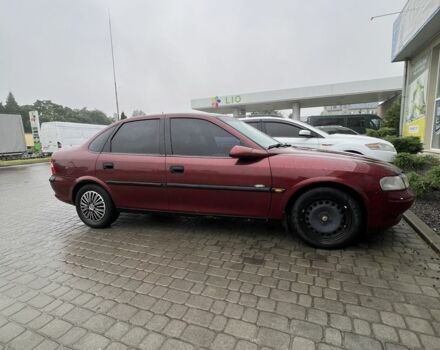 Красный Опель Вектра, объемом двигателя 1.8 л и пробегом 295 тыс. км за 1900 $, фото 1 на Automoto.ua