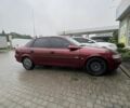 Красный Опель Вектра, объемом двигателя 1.8 л и пробегом 295 тыс. км за 1900 $, фото 1 на Automoto.ua