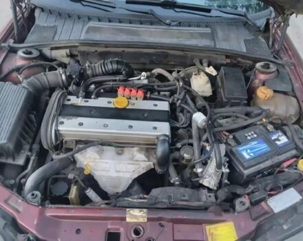 Красный Опель Вектра, объемом двигателя 1.8 л и пробегом 410 тыс. км за 2000 $, фото 6 на Automoto.ua