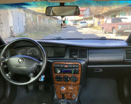 Червоний Опель Вектра, об'ємом двигуна 1.8 л та пробігом 287 тис. км за 2500 $, фото 21 на Automoto.ua