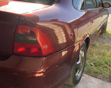 Червоний Опель Вектра, об'ємом двигуна 1.8 л та пробігом 287 тис. км за 2500 $, фото 2 на Automoto.ua