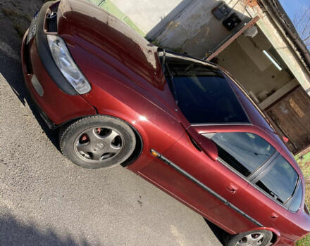 Червоний Опель Вектра, об'ємом двигуна 1.8 л та пробігом 287 тис. км за 2500 $, фото 11 на Automoto.ua