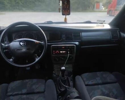 Красный Опель Вектра, объемом двигателя 1.8 л и пробегом 410 тыс. км за 2000 $, фото 7 на Automoto.ua