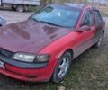 Красный Опель Вектра, объемом двигателя 1.8 л и пробегом 220 тыс. км за 950 $, фото 1 на Automoto.ua