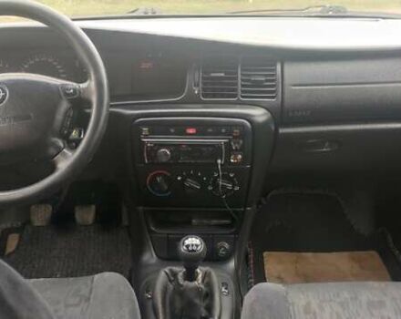 Красный Опель Вектра, объемом двигателя 1.8 л и пробегом 280 тыс. км за 2750 $, фото 9 на Automoto.ua