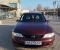 Красный Опель Вектра, объемом двигателя 2.02 л и пробегом 287 тыс. км за 2299 $, фото 1 на Automoto.ua