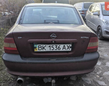 Красный Опель Вектра, объемом двигателя 1.8 л и пробегом 200 тыс. км за 999 $, фото 5 на Automoto.ua