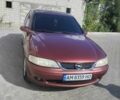 Красный Опель Вектра, объемом двигателя 1.8 л и пробегом 293 тыс. км за 2900 $, фото 1 на Automoto.ua