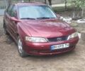 Красный Опель Вектра, объемом двигателя 1.8 л и пробегом 346 тыс. км за 2800 $, фото 1 на Automoto.ua