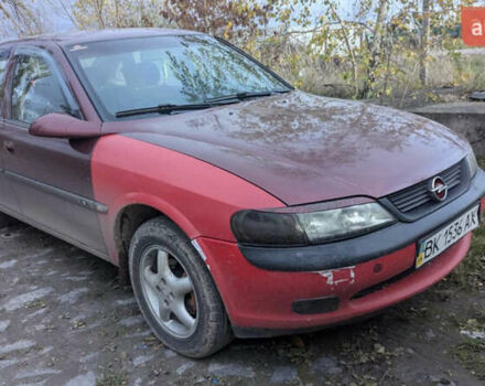 Красный Опель Вектра, объемом двигателя 1.8 л и пробегом 200 тыс. км за 999 $, фото 2 на Automoto.ua