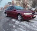 Красный Опель Вектра, объемом двигателя 2 л и пробегом 235 тыс. км за 1539 $, фото 1 на Automoto.ua