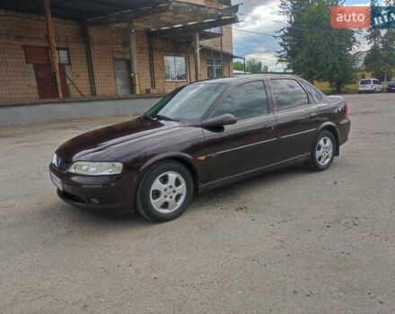 Красный Опель Вектра, объемом двигателя 1.8 л и пробегом 247 тыс. км за 3800 $, фото 6 на Automoto.ua