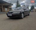Красный Опель Вектра, объемом двигателя 1.8 л и пробегом 247 тыс. км за 3800 $, фото 1 на Automoto.ua