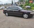 Красный Опель Вектра, объемом двигателя 1.8 л и пробегом 247 тыс. км за 3800 $, фото 4 на Automoto.ua