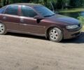 Червоний Опель Вектра, об'ємом двигуна 1.8 л та пробігом 284 тис. км за 3600 $, фото 7 на Automoto.ua