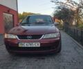 Красный Опель Вектра, объемом двигателя 2.2 л и пробегом 316 тыс. км за 3100 $, фото 1 на Automoto.ua
