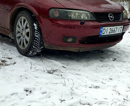 Красный Опель Вектра, объемом двигателя 18 л и пробегом 200 тыс. км за 2500 $, фото 9 на Automoto.ua