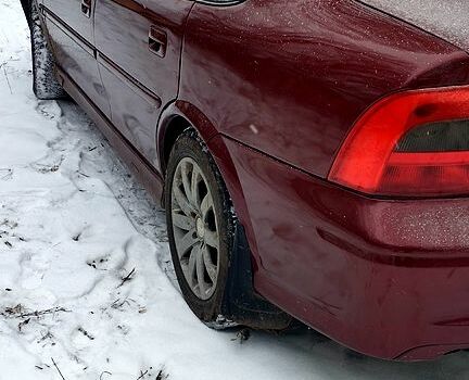 Красный Опель Вектра, объемом двигателя 18 л и пробегом 200 тыс. км за 2500 $, фото 6 на Automoto.ua