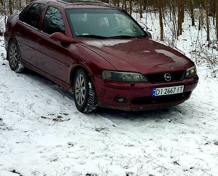 Красный Опель Вектра, объемом двигателя 18 л и пробегом 200 тыс. км за 2500 $, фото 1 на Automoto.ua