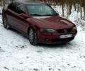 Красный Опель Вектра, объемом двигателя 18 л и пробегом 200 тыс. км за 2500 $, фото 1 на Automoto.ua