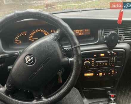 Красный Опель Вектра, объемом двигателя 2 л и пробегом 396 тыс. км за 2500 $, фото 1 на Automoto.ua