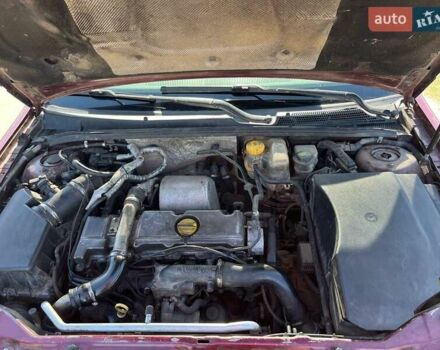 Красный Опель Вектра, объемом двигателя 2 л и пробегом 397 тыс. км за 3000 $, фото 6 на Automoto.ua