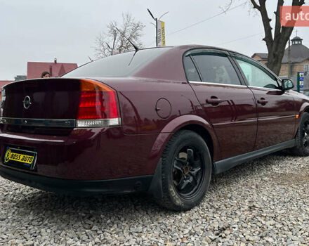 Красный Опель Вектра, объемом двигателя 2.2 л и пробегом 284 тыс. км за 4299 $, фото 6 на Automoto.ua