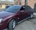 Красный Опель Вектра, объемом двигателя 1.8 л и пробегом 260 тыс. км за 1999 $, фото 1 на Automoto.ua