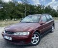 Красный Опель Вектра, объемом двигателя 0 л и пробегом 350 тыс. км за 750 $, фото 1 на Automoto.ua