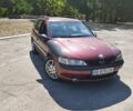 Красный Опель Вектра, объемом двигателя 1.6 л и пробегом 380 тыс. км за 2000 $, фото 1 на Automoto.ua