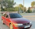 Красный Опель Вектра, объемом двигателя 1.6 л и пробегом 360 тыс. км за 2094 $, фото 1 на Automoto.ua