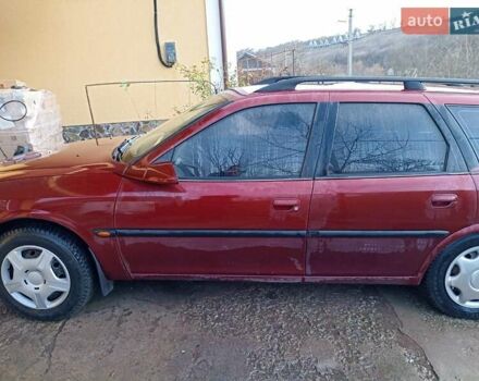 Красный Опель Вектра, объемом двигателя 1.8 л и пробегом 239 тыс. км за 1299 $, фото 2 на Automoto.ua