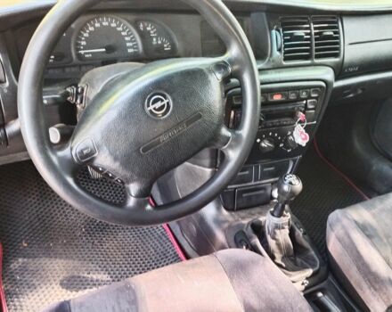 Червоний Опель Вектра, об'ємом двигуна 2 л та пробігом 323 тис. км за 1400 $, фото 4 на Automoto.ua