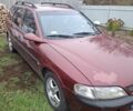 Красный Опель Вектра, объемом двигателя 2 л и пробегом 300 тыс. км за 1600 $, фото 1 на Automoto.ua