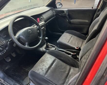 Червоний Опель Вектра, об'ємом двигуна 2 л та пробігом 250 тис. км за 1000 $, фото 6 на Automoto.ua