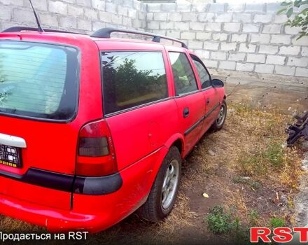 Червоний Опель Вектра, об'ємом двигуна 2 л та пробігом 286 тис. км за 700 $, фото 1 на Automoto.ua