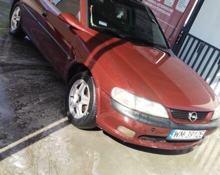 Червоний Опель Вектра, об'ємом двигуна 2 л та пробігом 323 тис. км за 1400 $, фото 1 на Automoto.ua