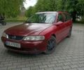 Красный Опель Вектра, объемом двигателя 1.6 л и пробегом 270 тыс. км за 2000 $, фото 1 на Automoto.ua