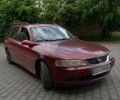 Красный Опель Вектра, объемом двигателя 1.6 л и пробегом 270 тыс. км за 2000 $, фото 1 на Automoto.ua