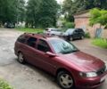 Красный Опель Вектра, объемом двигателя 1.8 л и пробегом 400 тыс. км за 1250 $, фото 1 на Automoto.ua